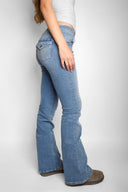 Low-waist flared jeans with wings - Unmatched Supply-SUBDUED